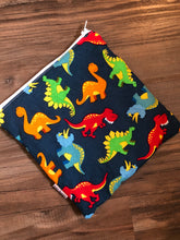Reusable snack or sandwich bag tossed dinos